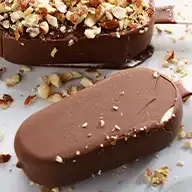 Ice cream bars with assorted chocolate coatings: milk, white, and nut-topped